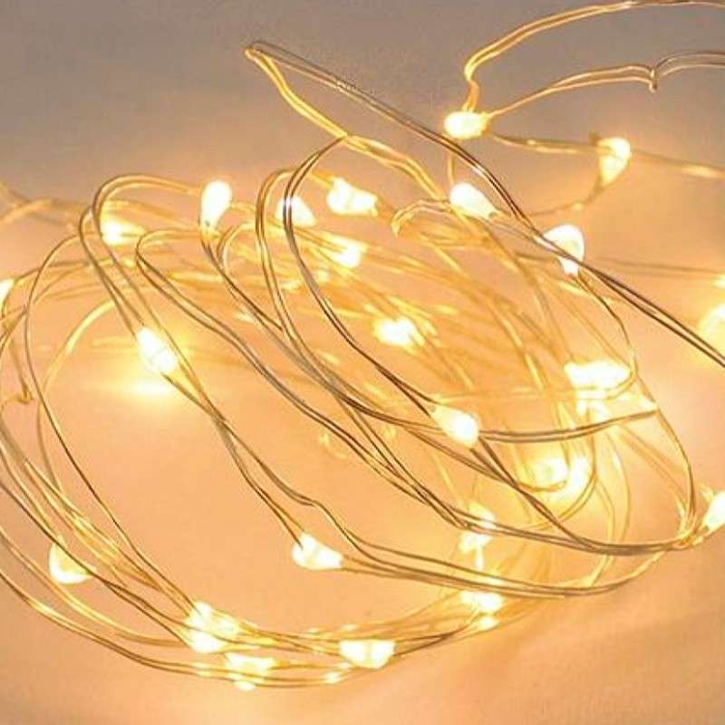 Cordão de luz LED 50 a pilhas luz quente grão de arroz