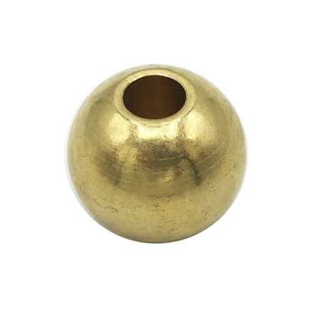 Peça de latão tipo com interior passante de 30mm de diâmetro.