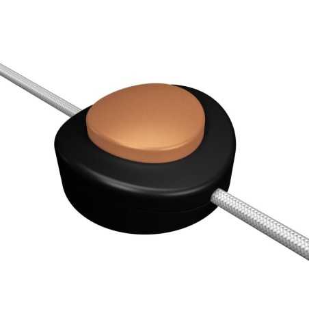 Interruptor para ser usado com o pé, preto e cobre, para lâmpadas.