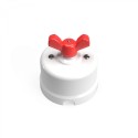 Comutador de porcelana branca com laço colorido.