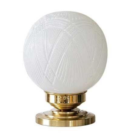 Lâmpada de mesa em latão com globo de vidro.